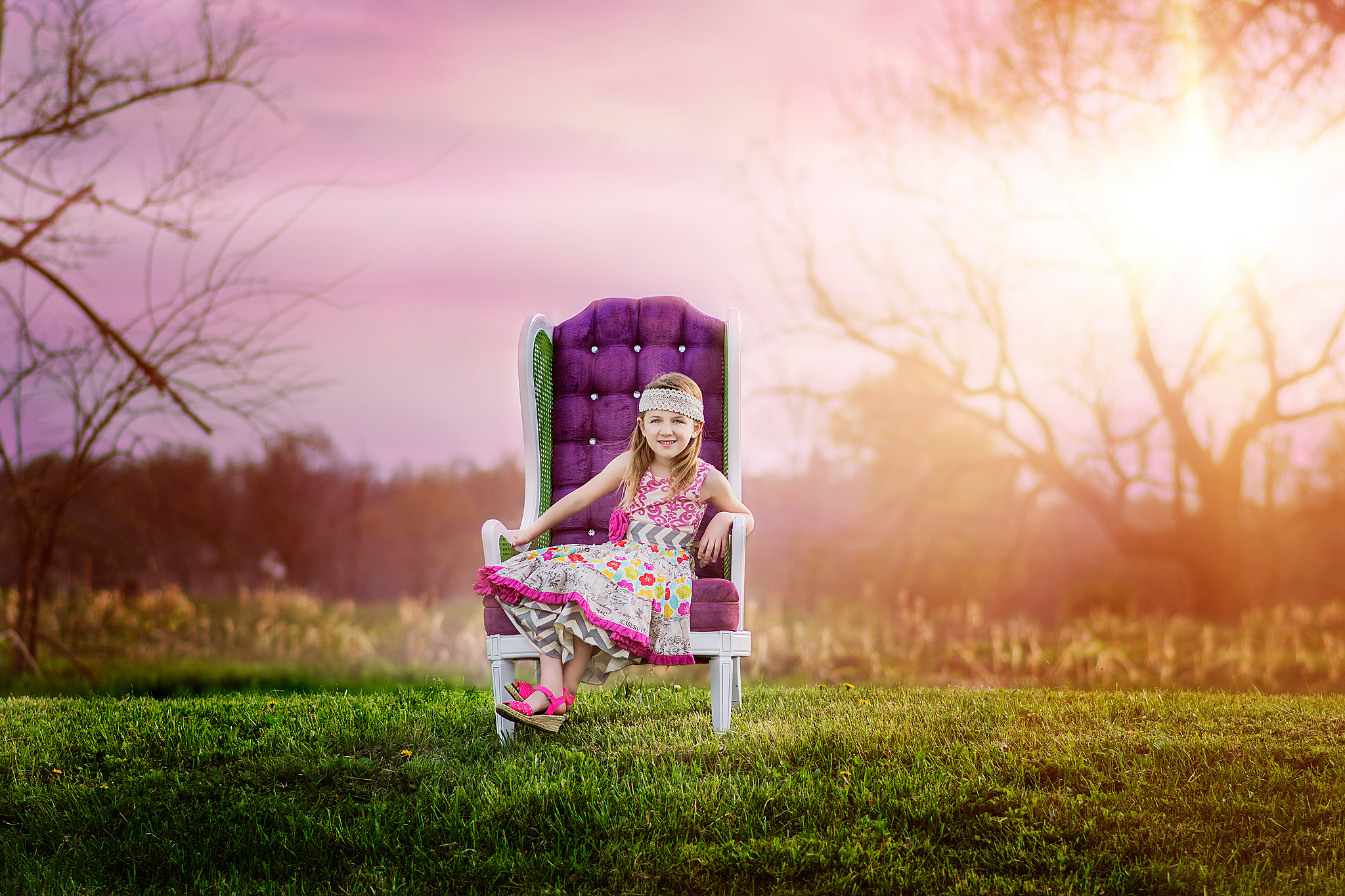 Young girl sitting in purple chair wearing mustard pie