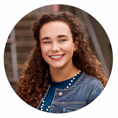 High School Senior Girl with Curly Hair Heiadshot by Louisville Senior Photographer in Anchorage KY