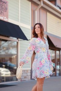 Woman walking through Westport Village in clothes from Darling State of Mind Boutique taken by Louisville Business Branding Photographer