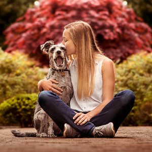 Louisville Senior Session of girl kissing her pet dog