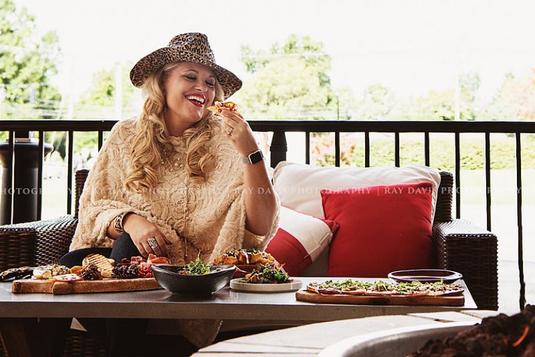 Woman enjoying tapas at Artesano now Steak and Bourbon restaurant in Westport VIllage