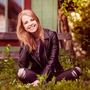 Louisville Senior Photographer portrait of Blonde girl in leather jacket