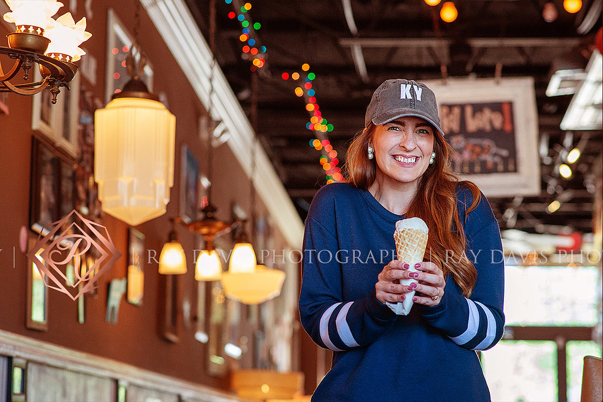 Woman holding icecream at the Comfy Cow during Louisville Branding photosession with Ray Davis Photography