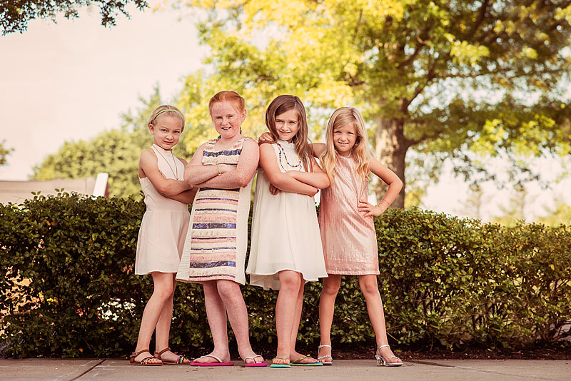 Tween Girl Friends of 4 girls wearing blush dresses with arms crossed by Louisville Child Photographer