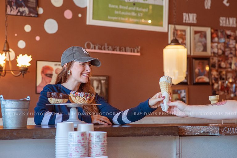 Woman getting ice cream at The Comfy Cow in Westport Village for Branding Session