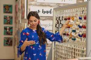 Girl Shopping Earrings at Tunies Boutique in Westport Village by Louisville Content Photographer