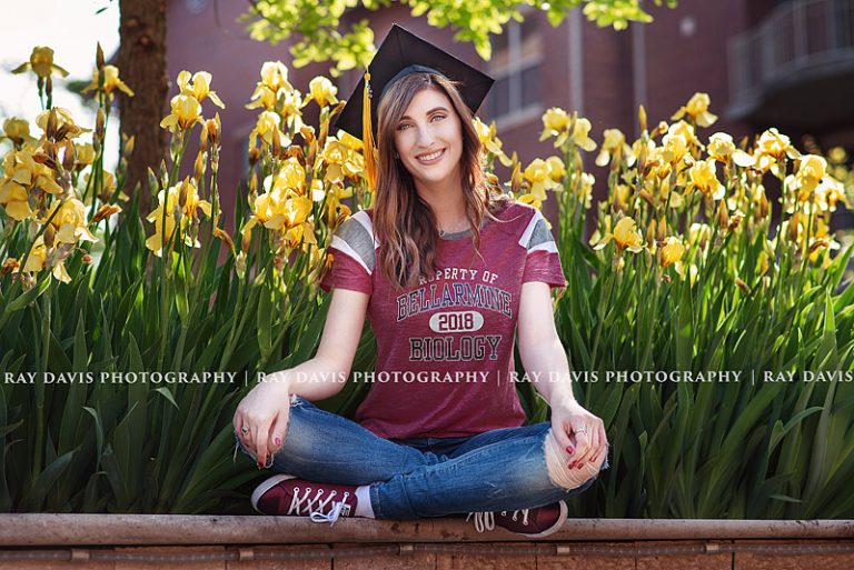 Bellarmine University Biology department grad sitting on campus by Louisville Photographer