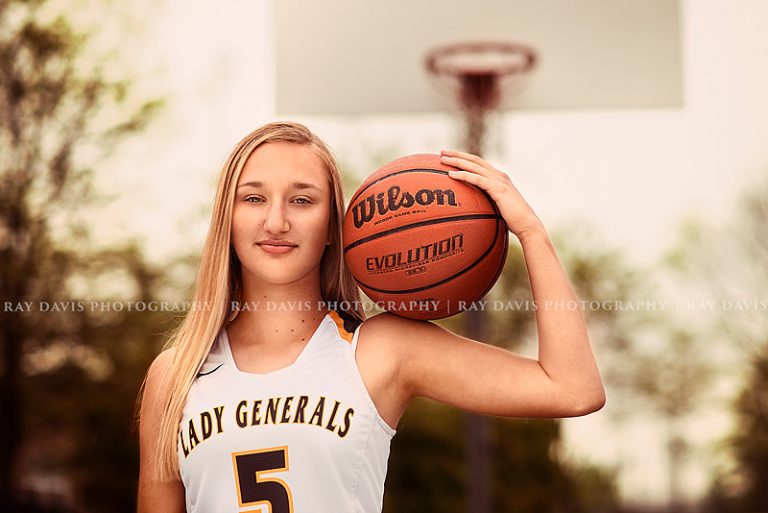 Senior Girl holding basketball by Louisville KY Photographer Ray Davis
