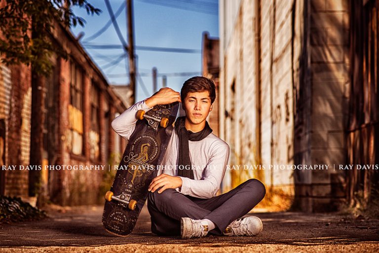 urban-senior-boy-skateboard-pose-downtown-louisville-ky