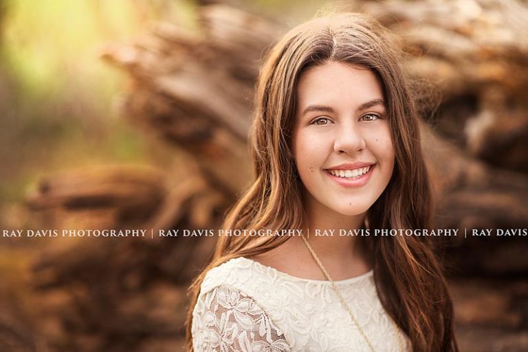 8th grade grad pictures of girl smiling created by Louisville teen photographer