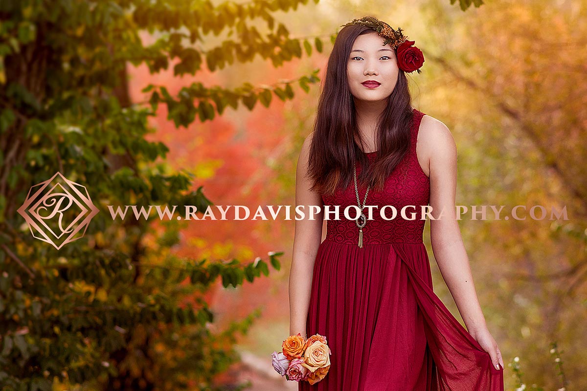 Girl in red dress and flower crown for Senior boho portraits in Louisville KY