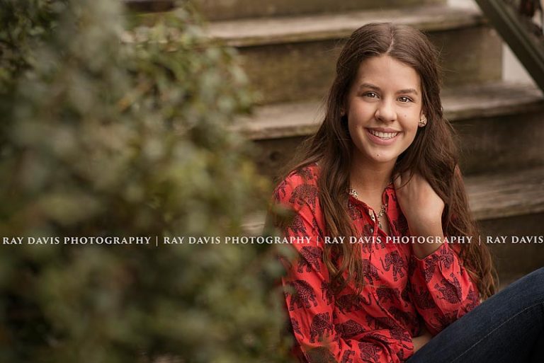 Teen girl sitting on steps in Anchorage KY by Louisville Family Photographer